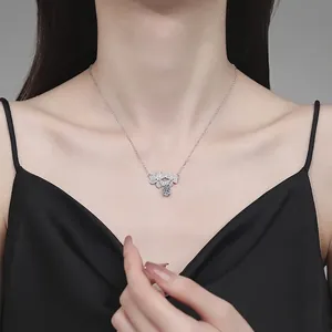 S925 silver clover necklace with moissanite pendant worn on model neck