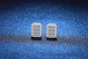Macro shot of S925 sterling silver square moissanite stud earrings with pave diamond details