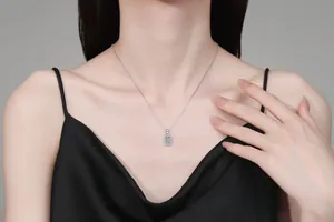 Detail of S925 sterling silver square pendant necklace with full moissanite stones