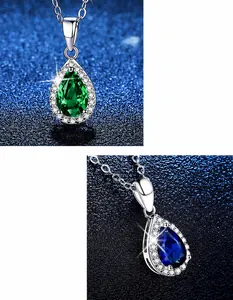 Detail van smaragd en saffier hangers met zirkonia micropavé op S925 zilveren ketting