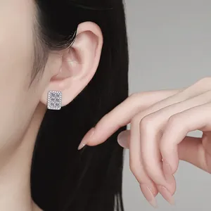 Minimalist S925 sterling silver square moissanite stud earrings on model's ear