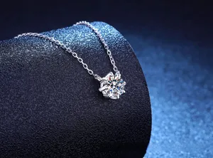 Macro detail of 1 carat moissanite solitaire necklace with six-prong setting on s925 silver