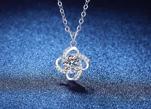 Macro view of S925 silver four-leaf clover pendant with pavé-set round moissanite