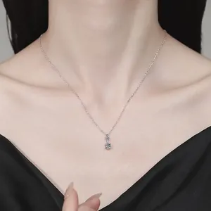 Elegant S925 sterling silver necklace with double moissanite pendants on female model