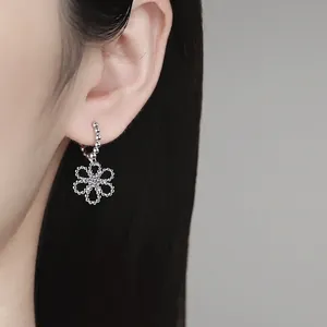 S925 sterling silver hoop earrings with a beaded camellia flower charm and moissanite center