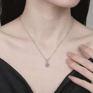 Minimalist S925 sterling silver necklace with a round brilliant cut moissanite pendant