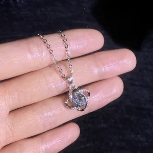 Elegant S925 silver four-leaf clover necklace with sparkling round moissanite pendant