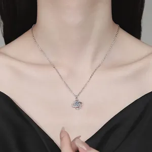 Moissanite S925 sterling silver four-leaf clover pendant necklace worn on a model