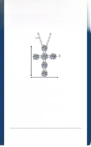Macro shot of S925 sterling silver cross pendant featuring a 1.2CT moissanite stone