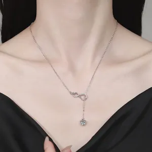 S925 sterling silver infinity necklace with 1-carat moissanite pendant on female model