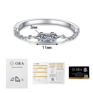 Close-up of moissanite ring with 3mm double stones and official GRA certification