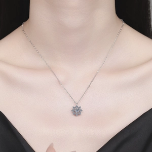 S925 sterling silver moissanite sunflower pendant necklace worn on a woman's neck