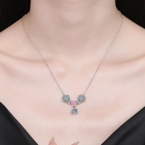 925 silver moissanite necklace with flower teardrop pendant worn by female model