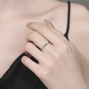 Elegant silver ring with double blue moissanite stones on a delicate chain band