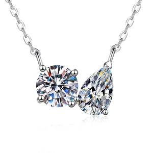 Elegant S925 silver necklace with round and pear cut moissanite stones on white background