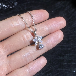 Sparkling S925 silver necklace featuring a butterfly pendant with marquise moissanite stones