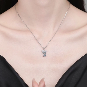Elegant s925 silver necklace with sparkling moissanite butterfly pendant on female model