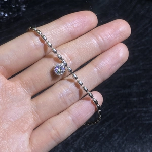 Minimalist S925 sterling silver beaded bracelet with a brilliant moissanite stone pendant