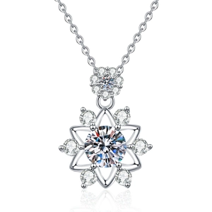 Elegant silver snowflake necklace with 1 carat moissanite pendant and sparkling halo stones