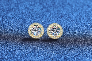 Macro shot of 925 silver halo stud earrings with 1-carat moissanite and gold finish
