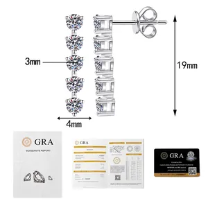 Macro view of S925 silver moissanite drop earrings with GRA certificate and size scale