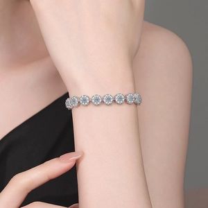 Elegant S925 sterling silver sunflower bracelet with moissanite stones on wrist
