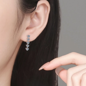 Elegant S925 sterling silver drop earrings featuring five vertical sparkling moissanite stones