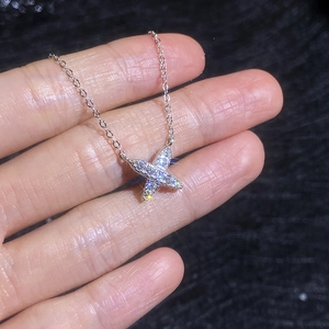 Sparkling S925 sterling silver X-shaped star pendant necklace with moissanite pavé