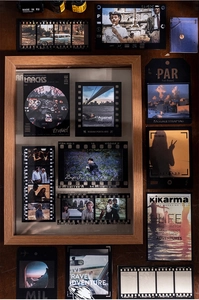 Close-up of vintage film frame decor with nostalgic travel cards and film strip elements