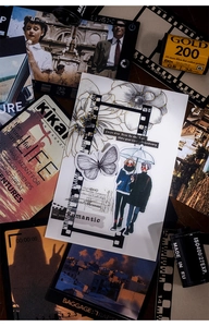 Macro view of vintage PET sticker frames with butterfly and floral collage elements