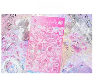 Detail showing Winter Fairy themed translucent gradient stickers for DIY journaling