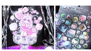 Close-up of Winter Fairy sticker set with pink anime character and icy crystal patterns