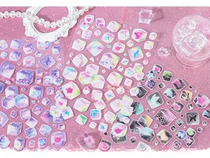 Macro detail of laser glitter sticker sheet with heart shapes for DIY craft scrapbooking
