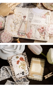 Detail of vintage floral scrapbooking paper with lace cutouts and retro collage elements