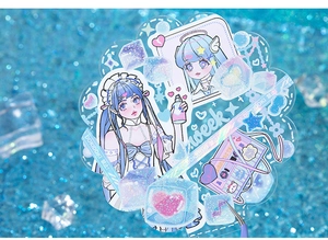 Macro shot of laser glitter stickers featuring anime girls and dreamy blue ice elements