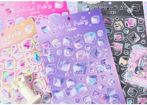 Detail of Winter Fairy stickers featuring icy hearts and stars with holographic finish