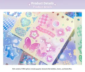 Macro shot of laser glitter stickers with butterfly and heart patterns for DIY scrapbooking