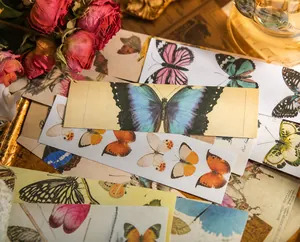 Detailed close-up of vintage butterfly stickers for DIY scrapbooking and artistic journals