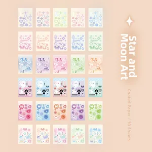 Flat lay of 30 dreamy star and moon themed scrapbooking stickers in various pastel colors