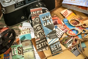 Detailed view of vintage aesthetic DIY stickers with old camera and retro stationery props