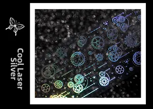 Detail of steampunk laser silver sticker with gears and holographic gear patterns