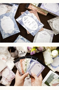 Close-up of vintage floral sticky notes for scrapbooking in multiple colors and textures