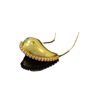Elegant gold-tone teardrop pendant necklace with pink cubic zirconia on a snake chain
