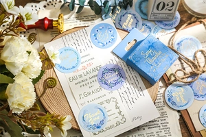 Detail of vintage floral Thank You stickers with gold stamping and decorative box