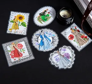 Dettaglio di adesivi vintage balletto con pizzo elegante e motivi floreali ricchi