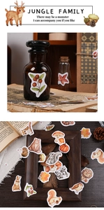Jungle Family stickers showing bear, squirrel and mushrooms on a vintage glass jar