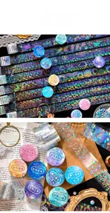 Detail of PET laser silver decorative tape showing butterfly and mandala dream patterns