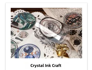 Detailed close-up of astronomy PET tape with crystal ink showing planets and gloss