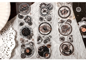 Detailed view of vintage steampunk stickers with celestial charts and clockwork gears