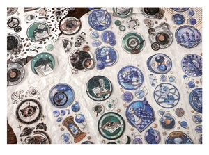 Detail view of PET stickers featuring vintage planets, chess pieces and starry sky motifs
